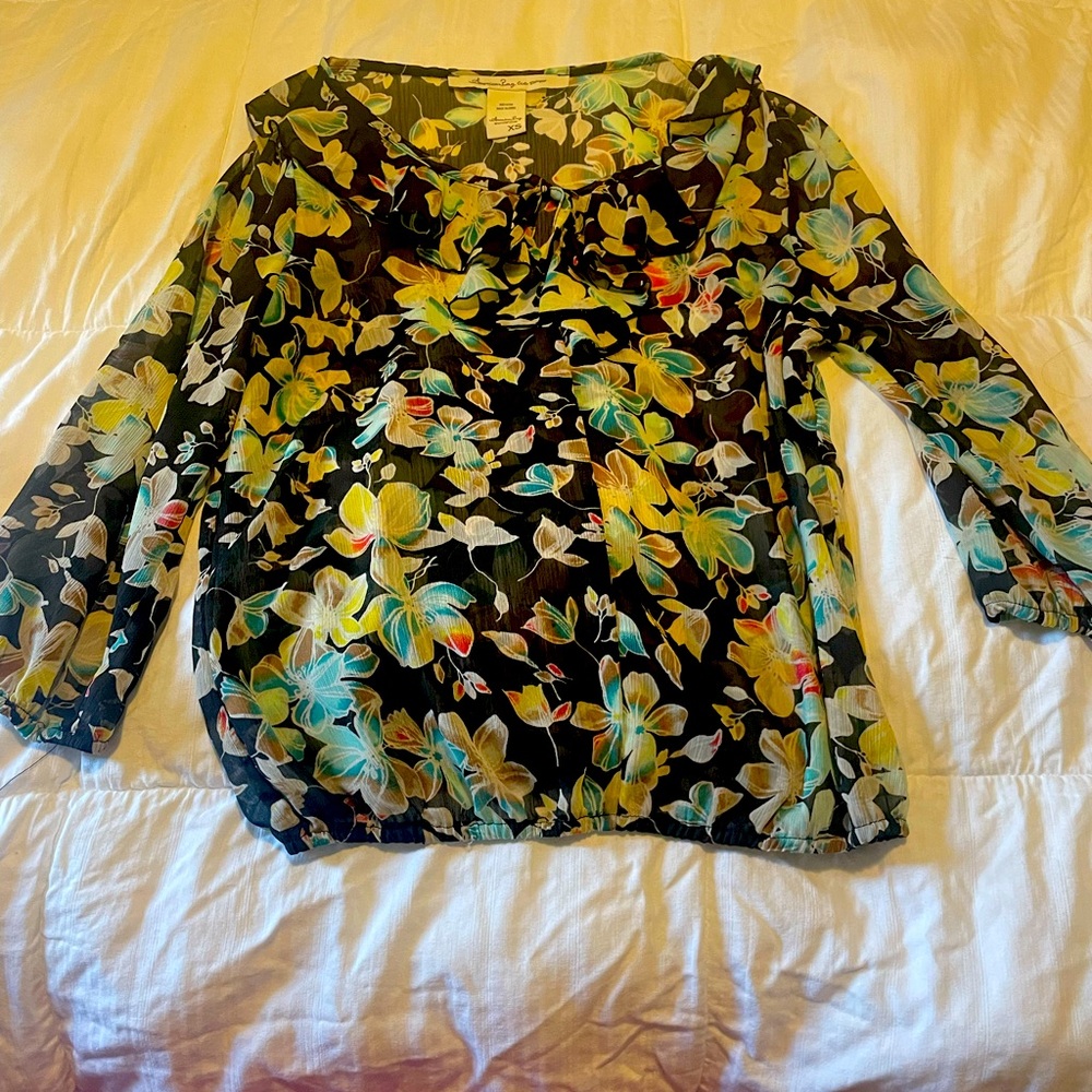 American Rag- cute top you can dress up or down.